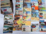 98 to 100 postcard souvenir folders, USA