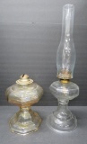 Two oil lamps, clear