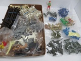 Over 100 Plastic figures, horses, soldiers, cowboys/Indians, and fencing
