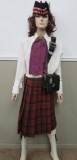 Scottish outfit with kilt, hat and bag