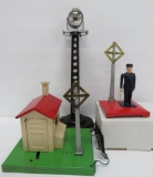 Lionel accessory lot, #1045 Flagman, automatic gateman and search light tower