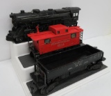 Lionel engine 675, metal 477618 red caboose and 3469 dump car