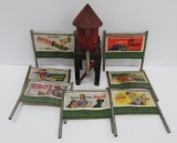 Vintage Metal water tower and seven Lionel metal frame billboards, Train layout accessories
