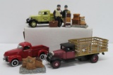Three die cast truck and ceramic figures for train layouts