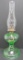 Green glass oil lamp, base is 8 1/2