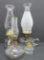 Four small and miniature oil lamps, 2 1/2