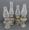 Four vintage fingertip oil lamps, 4 1/2