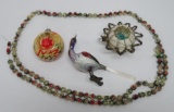 Three antique ornaments and glass beaded garland