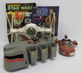 Vintage Star Wars vehicle lot and two books