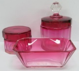 Polished cranberry glass covered dishes and dish
