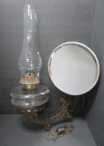 Ornate metal bracket lamp with reflector and wall mount, 19