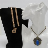 Egyptian revival style necklace and lion pendant necklace