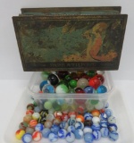 Over 160 machine marbles with vintage storage tin