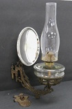 Ornate Cast iron bracket lamp with reflector