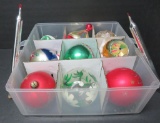 Nine glass ornaments and two glass candles, 3 1/2