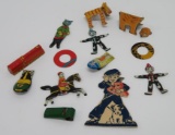 13 Metal and paper Cracker Jack type toys