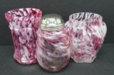 Three pieces of spatter pattern cranberry glass