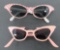 Two pair of pink cat eye sunglasses