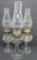 Three pattern glass oil lamps with chimneys, grape, wave and tassel design