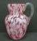 Art glass cranberry speckled spattered pitcher, 8