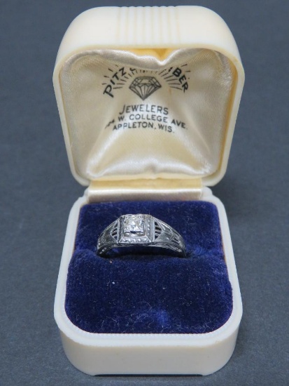 Diamond solitaire ring, marked "18 K", size 6 1/4 with vintage ring box