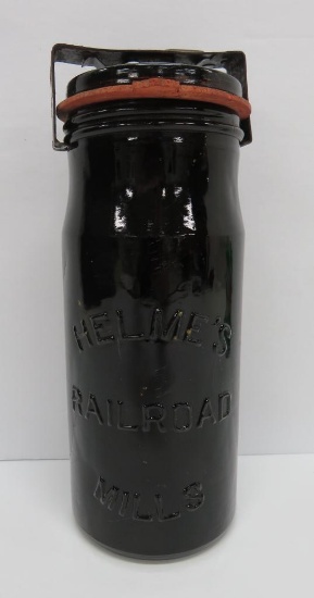 Helme's Railroad Mills amber jar, 8"