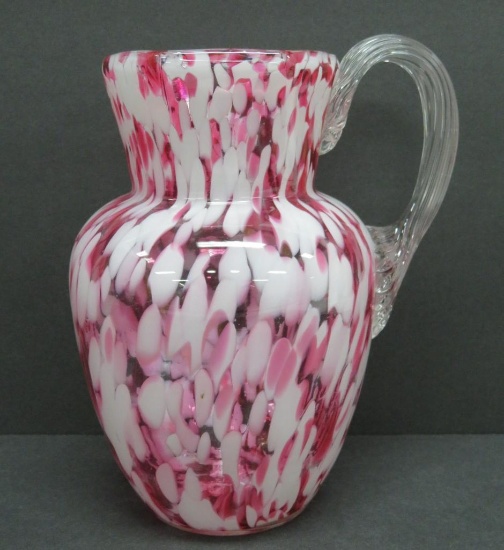 Art glass cranberry speckled spattered pitcher, 8", applied handle