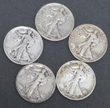 Five walking Liberty silver half dollars