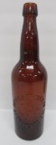 Embossed Buffalo Brewing Co bottle , amber, 11 1/2