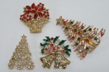 Four vintage Christmas pins