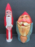 Two folk art carved wooden Santa Claus figures by local carver Bob Hughes