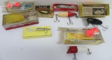 Seven vintage fishing lures six with boxes
