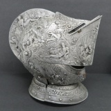 French style cast metal closed helmet, ornate, raised scenes, 13