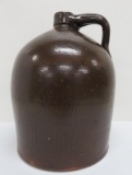 C Hermann Co Milwaukee brown glaze jug, 13