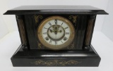 Waterbury mantle clock, black with gold decorated columns and design, pat 1881