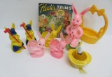 8 plastic Easter decorations, candy containers, and Fleck's gum trims