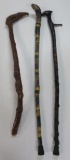 Three folk art wood canes, 32