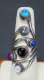 Modernistic ring, marked 925, six inset stones, size 6 1/2