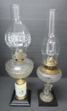Two vintage oil lamps, painted base and cherub base