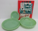 Assorted patterned Fire King Jadeite, four pieces and book