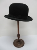 Vintage Derby hat and wooden hat stand