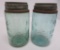 Two Mason 1858 pint jars, light green and aqua