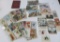 About 100 vintage postcards and storage album