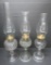 Three patterned oil lamps, 8