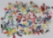 About 198 Cracker Jack type plastic toys