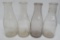 Four quart milk bottles, Gridley and Bazals