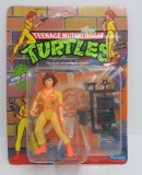 1990 Teenage Mutant Ninja Turtles figure on blister pak, April O'Neil