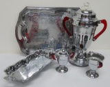 United Chrome and red lucite handled coffee service, with Danny Wilson trays