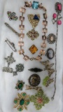 Assorted costume jewelry, pins and necklaces