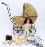 Antique Dep 154 2 1/4 bisque head doll attributed to Kestner and wicker doll buggy